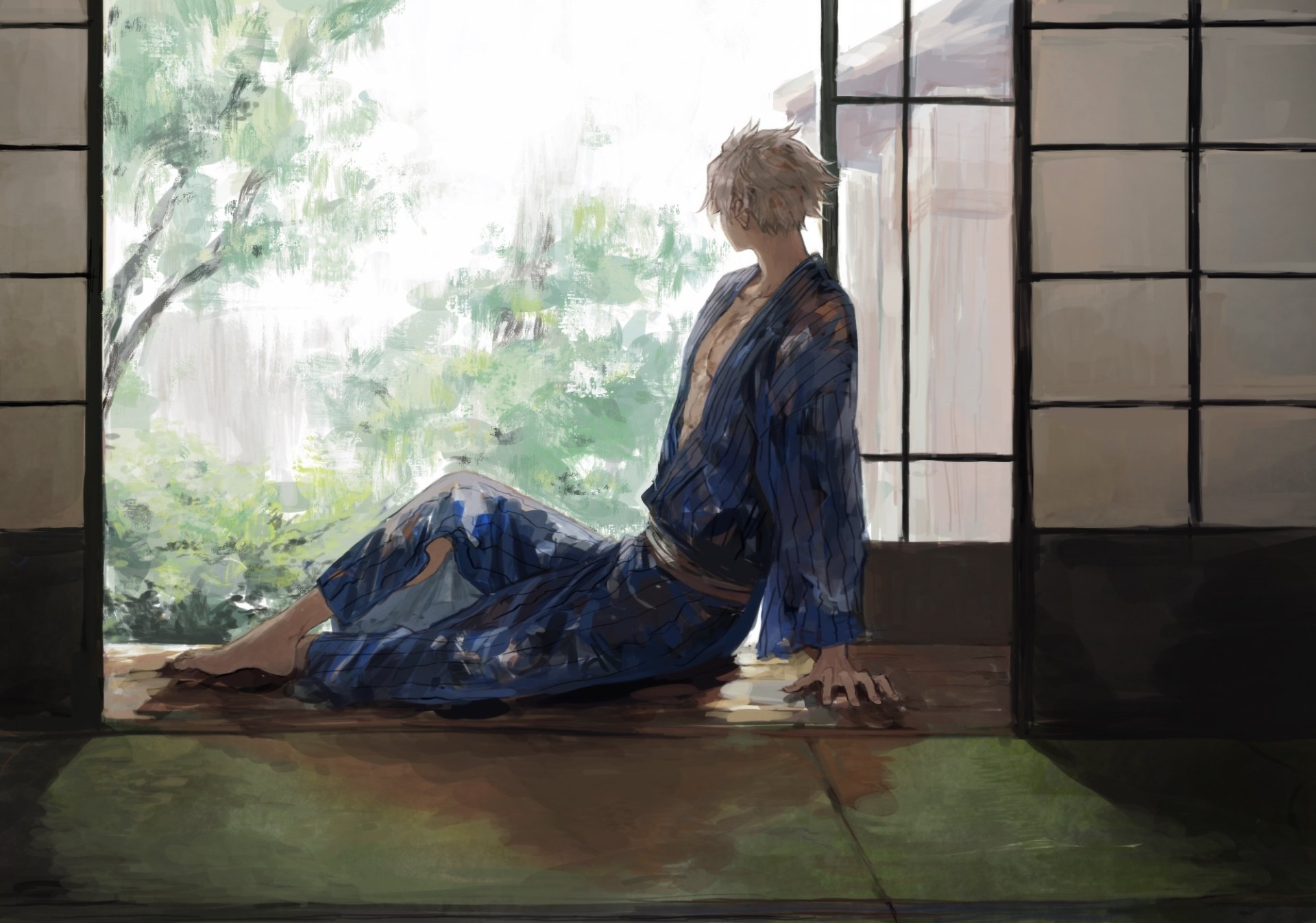 HD PC desktop wallpaper featuring an anime scene from Demon Slayer: Kimetsu no Yaiba, showing a character in a blue kimono sitting by a traditional Japanese sliding door.