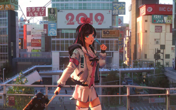 An HD desktop wallpaper featuring Kizuna AI from AI Channel in an anime style. She is pictured standing in a cityscape, animated and lively, with various colorful signs and buildings in the background.