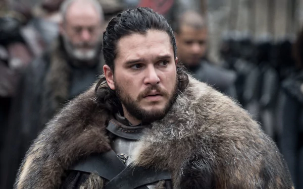 Brooding medieval warrior in a heavy fur cloak from the Game of Thrones TV show, dramatic 2K Quad HD PC desktop wallpaper and background.