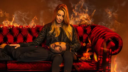 HD desktop wallpaper featuring Tom Ellis as Lucifer Morningstar and Lauren German as Chloe Decker from the TV show Lucifer, with fiery elements in the background.