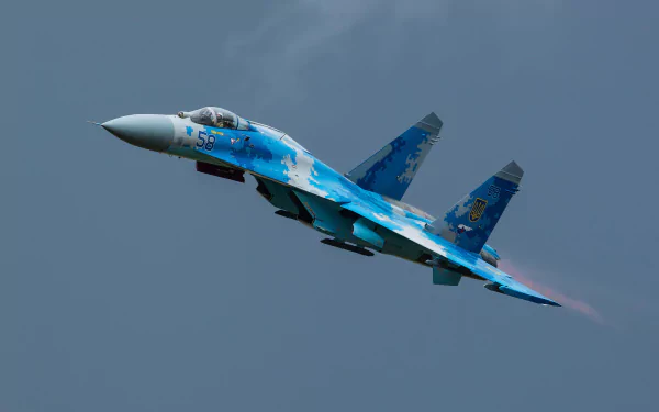 A high-resolution 4K Ultra HD image of a military Sukhoi Su-27 jet fighter warplane soaring through a clear sky.