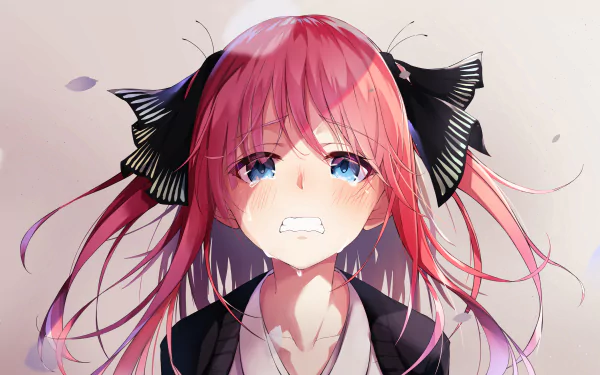 HD desktop wallpaper featuring Nino Nakano, an anime character from The Quintessential Quintuplets, with a determined expression and flowing pink hair, set against a neutral background.