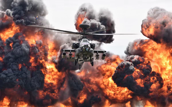 A Boeing AH-64 Apache attack helicopter flies amid large fiery explosions and thick black smoke in a dynamic military HD desktop wallpaper.