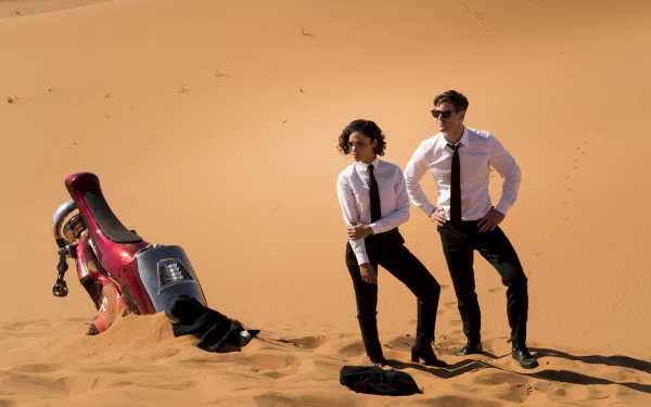 Tessa Thompson Chris Hemsworth movie Men in Black: International HD Desktop Wallpaper | Background Image