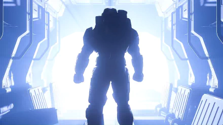 HD PC desktop wallpaper featuring Master Chief from the video game Halo Infinite, standing silhouetted in a futuristic, glowing corridor.