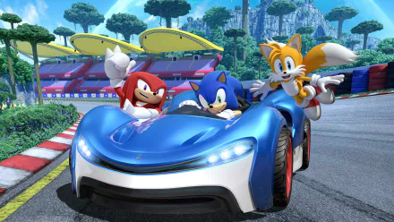HD PC desktop wallpaper featuring Sonic the Hedgehog, Knuckles the Echidna, and Miles Tails Prower racing in a sleek car from the video game Team Sonic Racing.