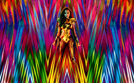 Gal Gadot as Diana Prince in vibrant golden Wonder Woman armor, set against a dynamic, colorful abstract background from Wonder Woman 1984 in 8K Ultra HD.