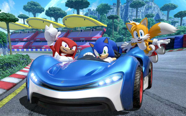 HD PC desktop wallpaper featuring Sonic the Hedgehog, Knuckles the Echidna, and Miles Tails Prower racing in a sleek car from the video game Team Sonic Racing.