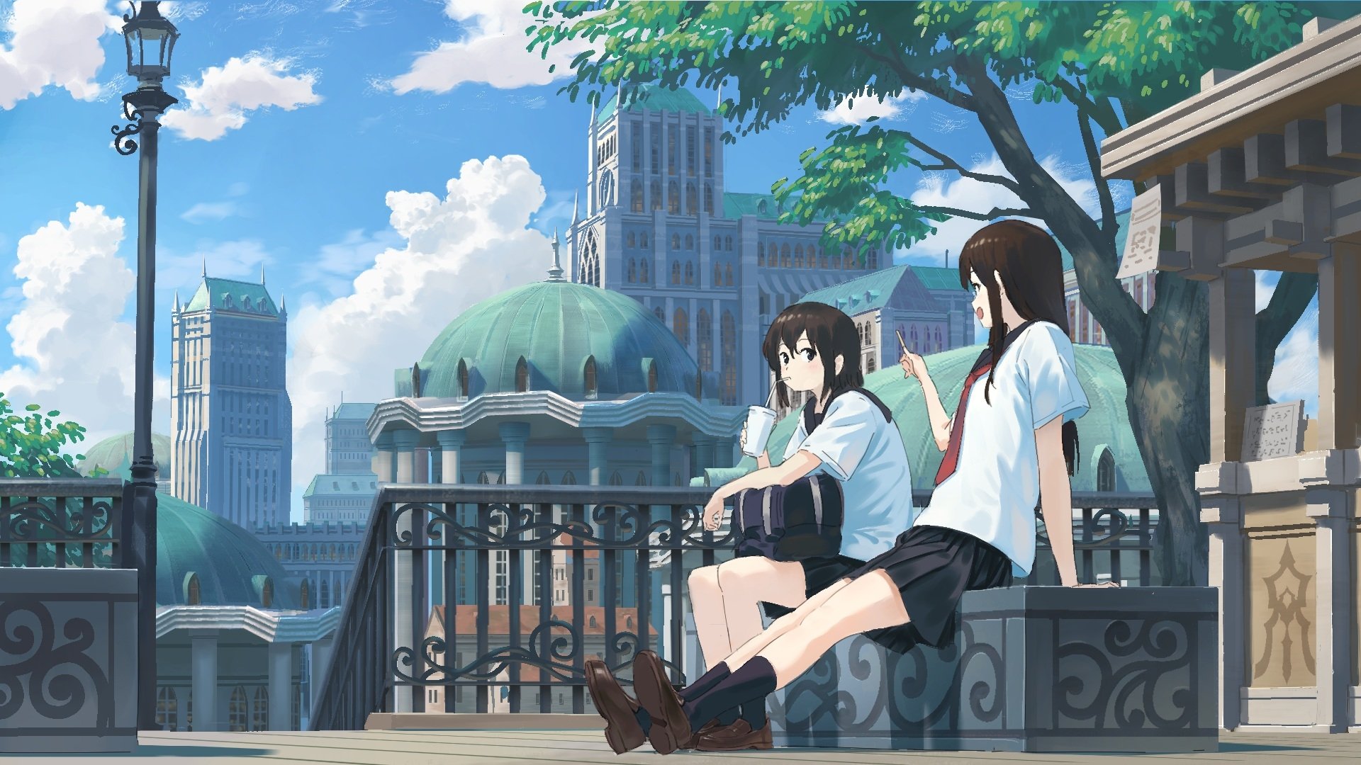 Anime-style HD desktop wallpaper depicting two long black-haired girls in school uniforms sitting by a railing in a vibrant cityscape under a bright blue sky.