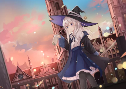 Elaina from Wandering Witch: The Journey of Elaina, with white hair and blue eyes, wearing a witch hat in a detailed anime cityscape at sunset, HD desktop wallpaper.