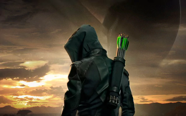 HD PC desktop wallpaper featuring Stephen Amell as the Arrow from the TV show, standing with his quiver of arrows against a dramatic sunset sky.