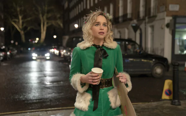 Emilia Clarke in a scene from the movie Last Christmas, featured as a 4K Ultra HD PC desktop wallpaper and background.