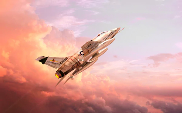 North American F-100 Super Sabre jet fighter climbing through pink-orange clouds against a dramatic sky — military aircraft HD PC desktop wallpaper and background.