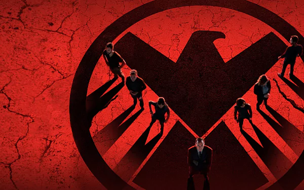 4K Ultra HD desktop wallpaper featuring the Agents of S.H.I.E.L.D. team standing on a cracked red surface with the S.H.I.E.L.D. emblem casting long shadows.