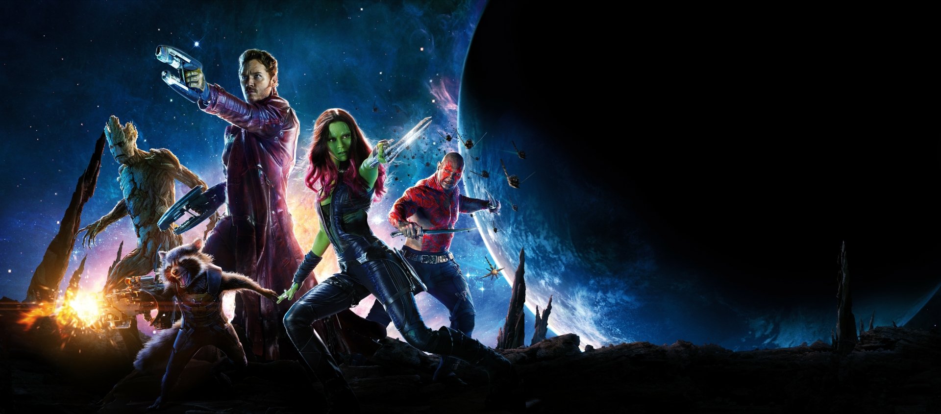 HD desktop wallpaper featuring Guardians of the Galaxy characters Star Lord, Drax, Groot, Rocket Raccoon, and Gamora against a cosmic backdrop. Tags: Chris Pratt, Zoe Saldana, Dave Bautista.