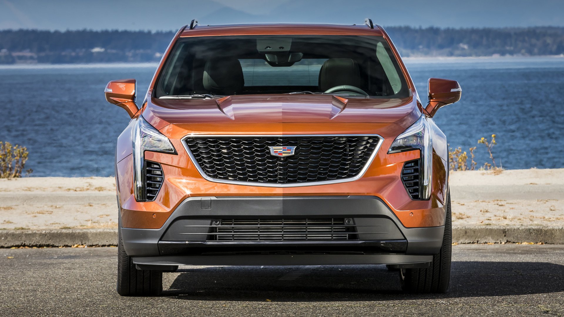Download Orange Car SUV Car Cadillac Vehicle Cadillac XT4 HD Wallpaper