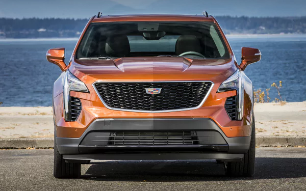 orange car SUV car Cadillac vehicle Cadillac XT4 HD Desktop Wallpaper | Background Image