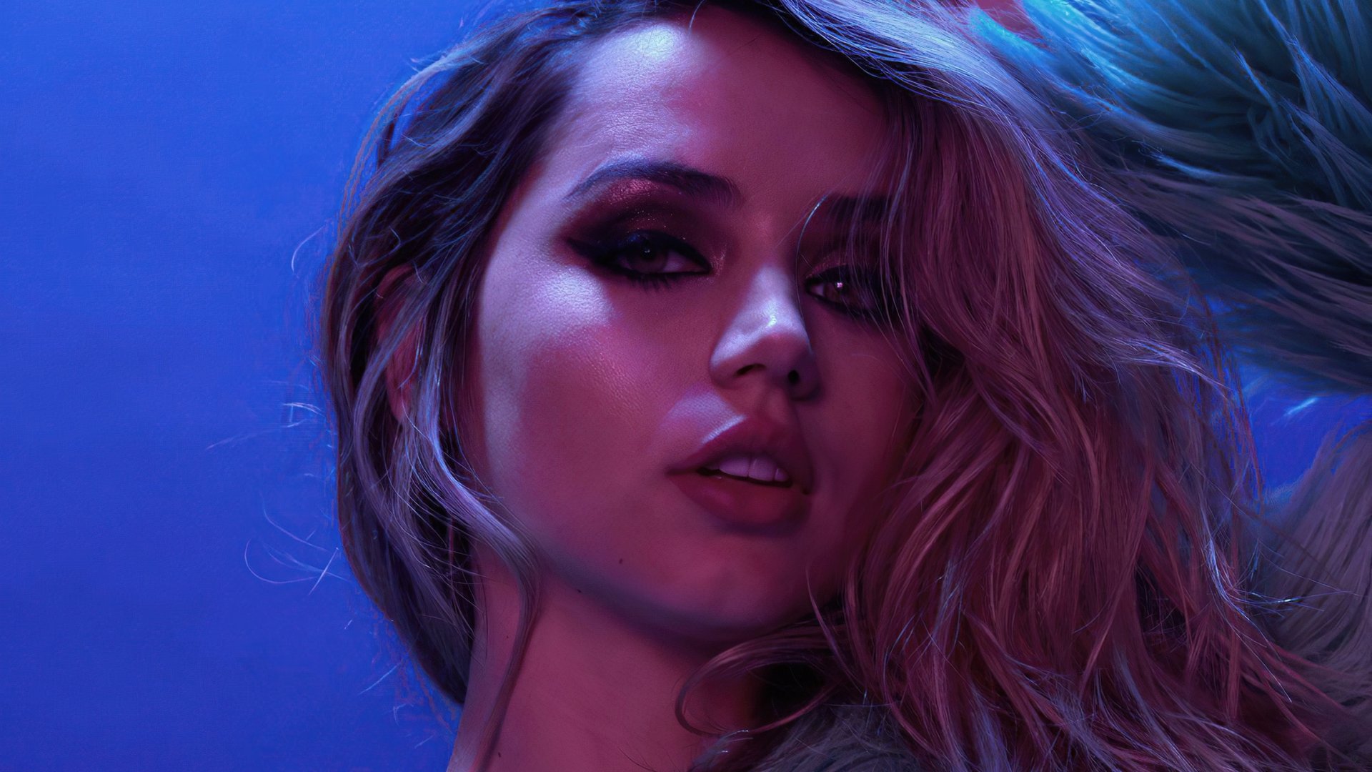 HD PC desktop wallpaper featuring a close-up of Cuban actress Ana de Armas with dramatic lighting highlighting her face against a blue background.