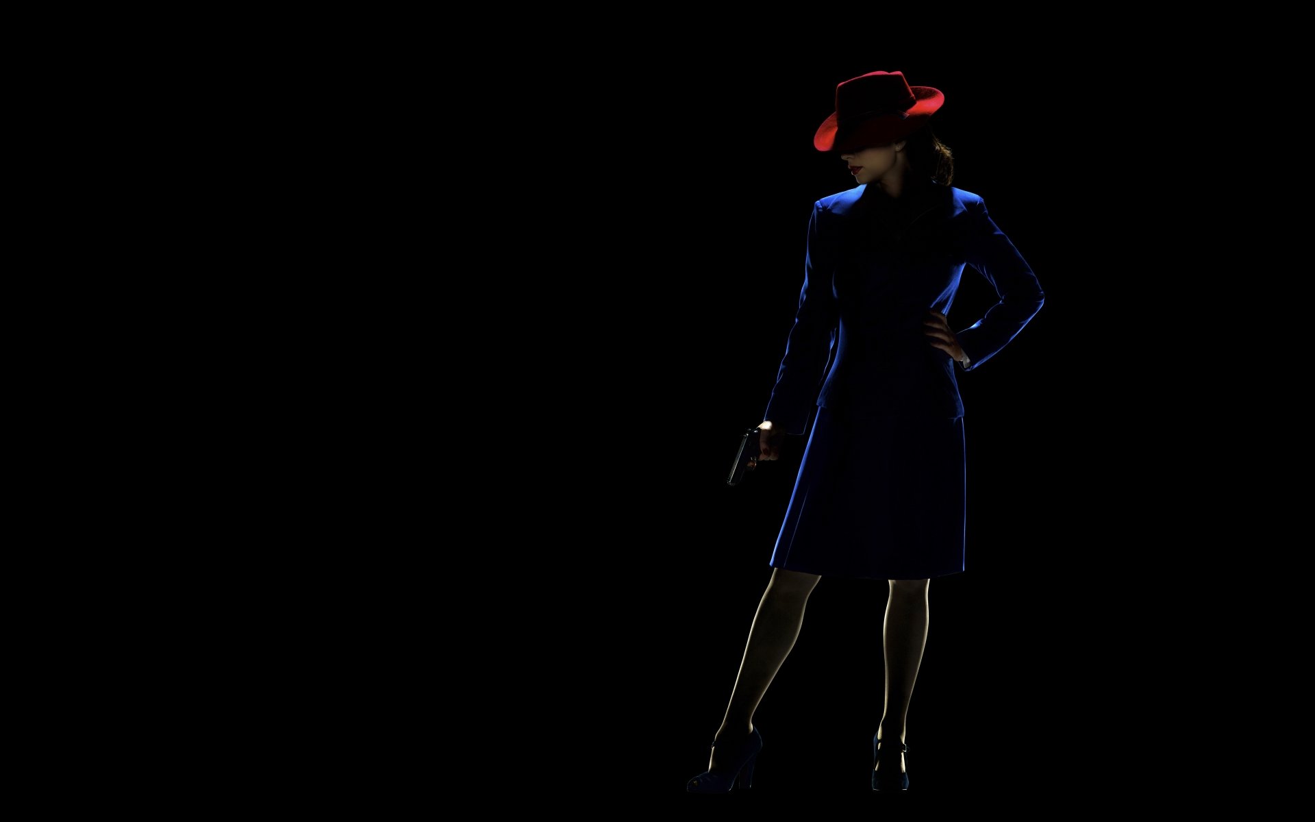 8K Ultra HD PC desktop wallpaper: silhouetted 1940s TV-show female agent in a blue coat and red fedora, hand on hip against a deep black background.
