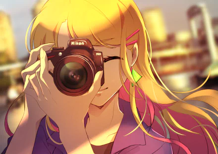 Anime-style illustration of a blonde character holding a Nikon camera, captured in vibrant colors for a 4K Ultra HD PC desktop wallpaper background.