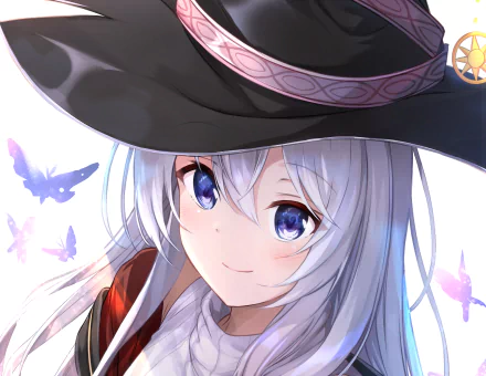 A vibrant HD wallpaper featuring Elaina from *The Journey of Elaina* (Majo no Tabitabi), showcasing her enchanting smile and magical atmosphere with butterflies around her.