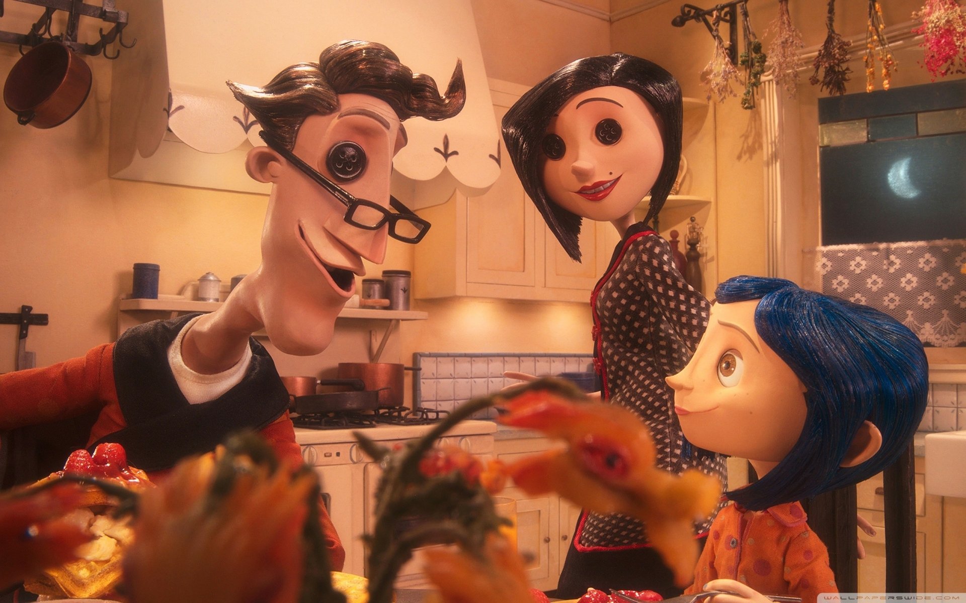 HD PC desktop wallpaper featuring Coraline Jones and characters from the Coraline movie in a warmly lit kitchen scene.