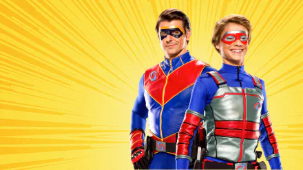 HD desktop wallpaper featuring two characters from Henry Danger standing heroically against a vibrant yellow background with rays.