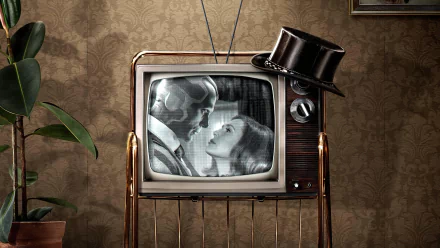 Vintage TV in a retro living room displays a black-and-white close-up of Vision and Wanda Maximoff from the WandaVision TV show — 5K Ultra HD PC desktop wallpaper.