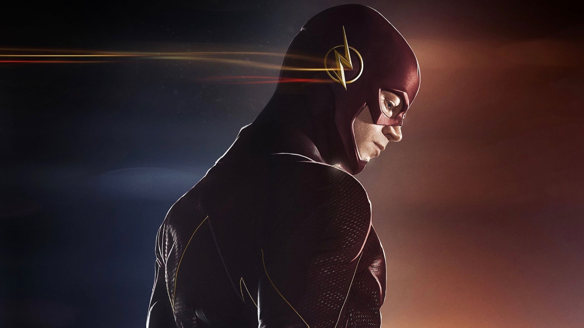 HD desktop wallpaper of Grant Gustin as Barry Allen in his Flash costume, from the TV show The Flash (2014), set against a blurred, dynamic background with speed light effects.
