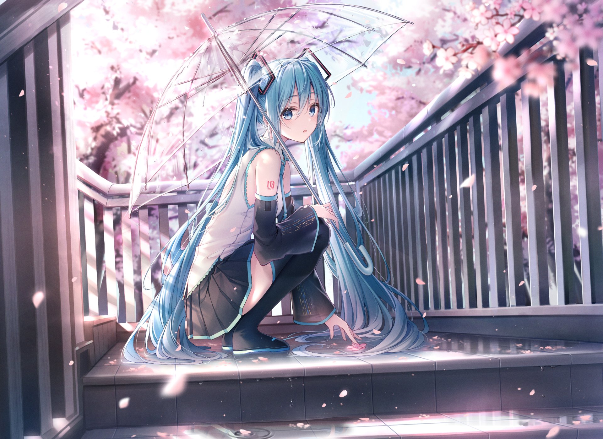 Aqua-eyed Hatsune Miku with long blue hair, wearing a skirt and boots, sits under an umbrella among cherry blossoms, creating a vibrant anime-themed desktop wallpaper.
