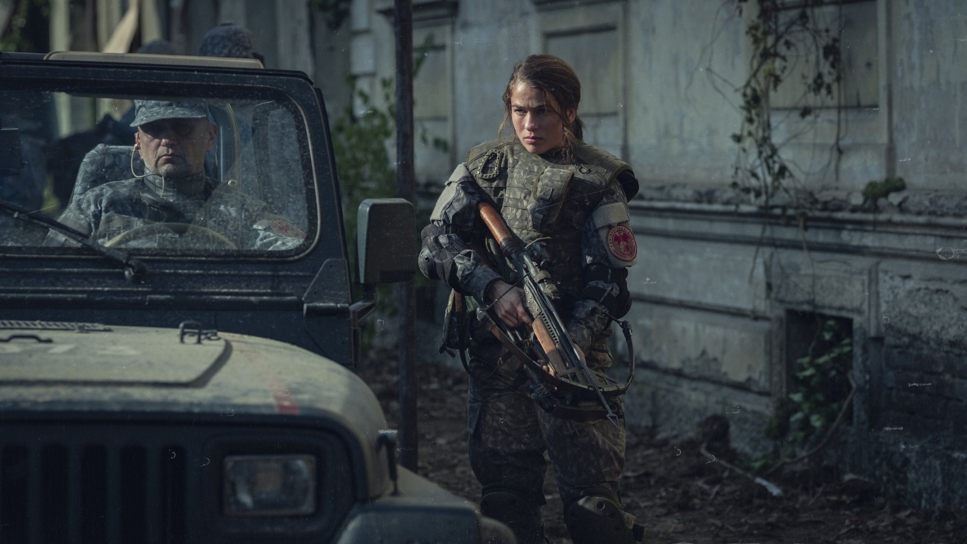 HD wallpaper of Tribes of Europa with an armed character in a dystopian setting, suitable as a desktop background.