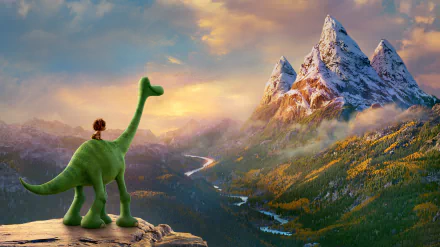 HD desktop wallpaper featuring a beautiful landscape from the movie The Good Dinosaur, showcasing a green dinosaur and a child overlooking a scenic valley with snow-covered mountains in the distance.
