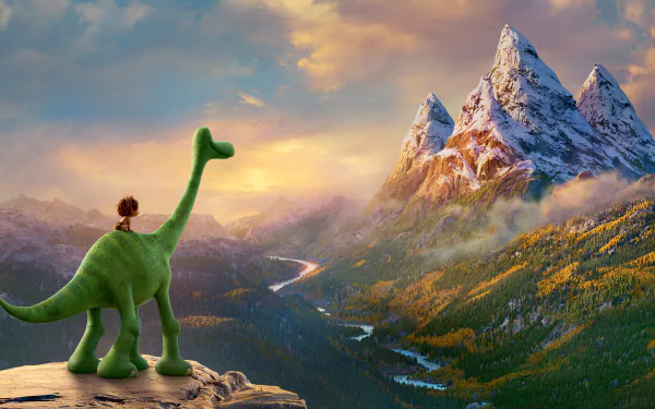 HD desktop wallpaper featuring a beautiful landscape from the movie The Good Dinosaur, showcasing a green dinosaur and a child overlooking a scenic valley with snow-covered mountains in the distance.
