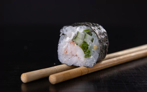  Sushi maki roll with black background
