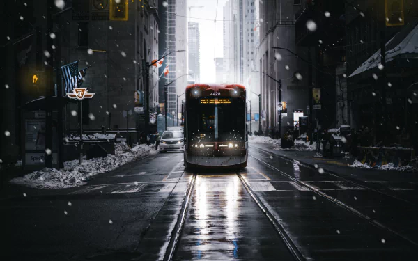 A picturesque high-definition desktop wallpaper showing a beautifully captured tram vehicle in a serene urban setting.