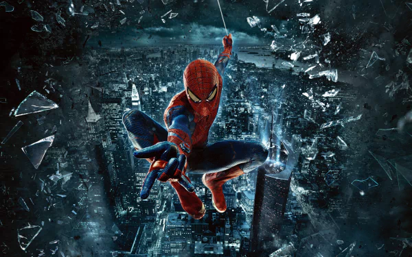 4K Ultra HD PC desktop wallpaper of Spider-Man (The Amazing Spider-Man) diving through shattered glass toward the viewer above a glowing nighttime cityscape.