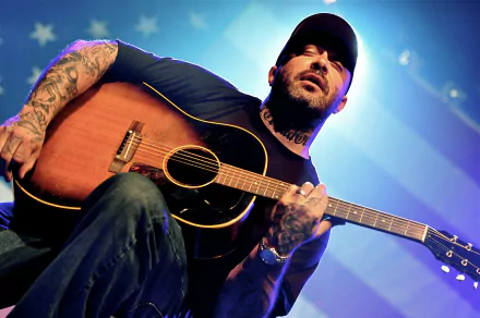 Guitarist performing on stage HD desktop wallpaper and background.