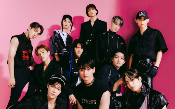 HD desktop wallpaper featuring The Boyz, a popular K-pop boy band, posing against a vibrant pink background.