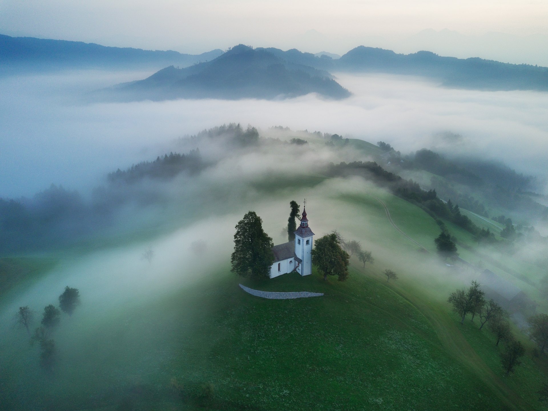 Download Hilltop Slovenia Fog Religious Church 4k Ultra HD Wallpaper by Andrey Rodionov