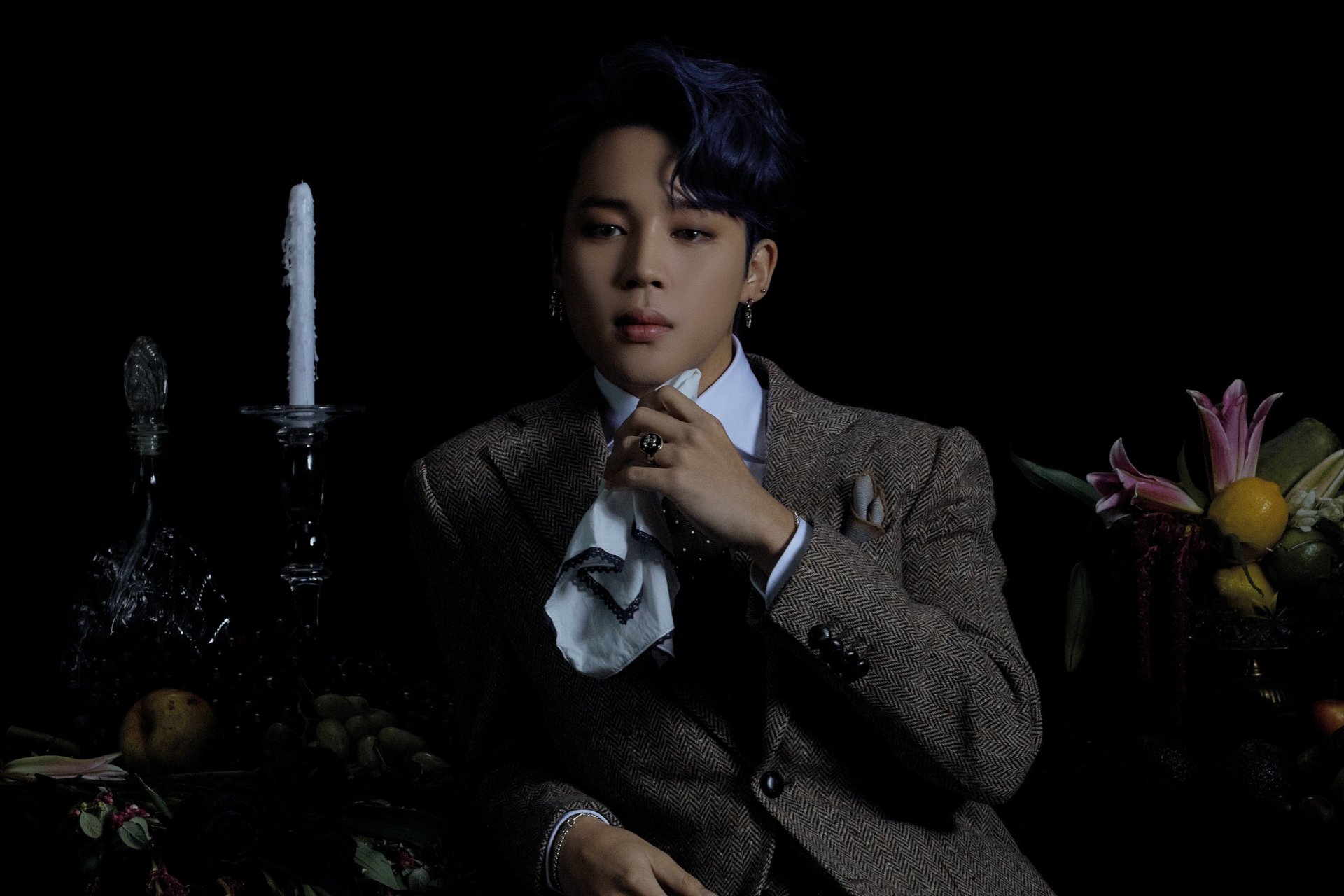 HD PC desktop wallpaper featuring Jimin (Park Jimin) from BTS, a K-pop singer, dressed in a suit with a dark, elegant background and candlelight ambiance.