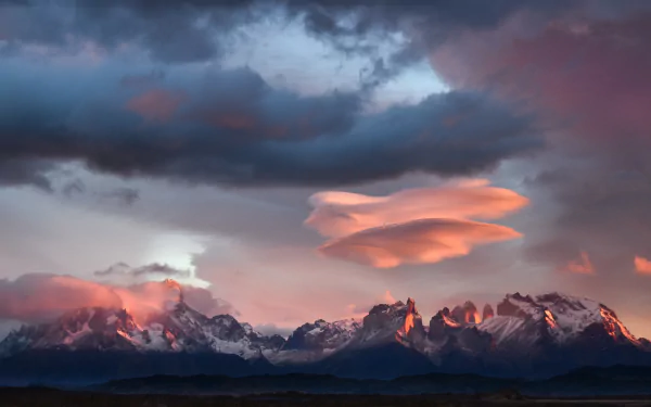  Lenticular clouds at sunrise, Torres del Paine, Chile by Marc Thunis