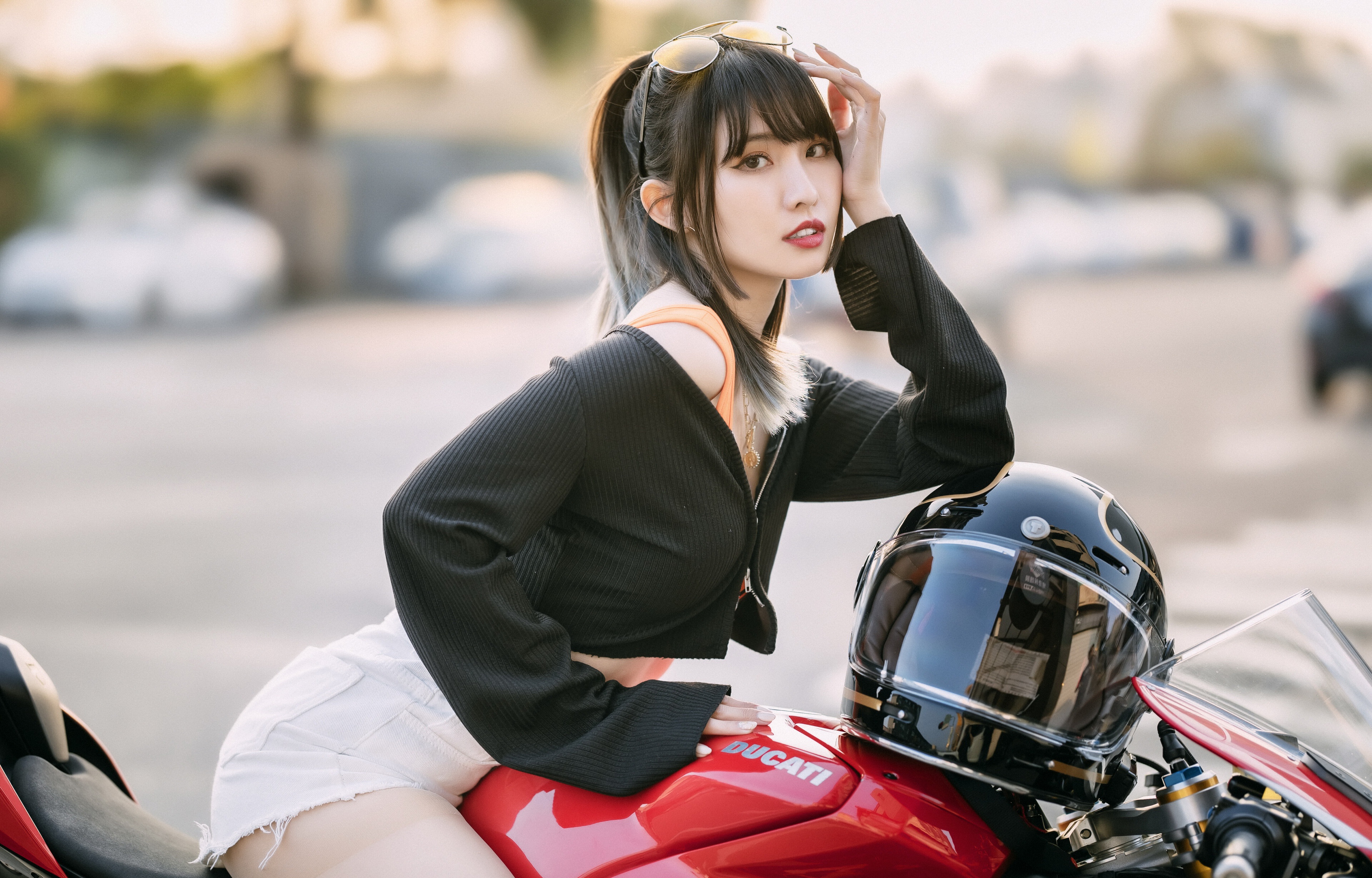 4K Ultra HD Portrait of Asian Woman Posing with Motorcycle