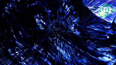 2K Quad HD PC desktop wallpaper: blue futuristic warp-speed tunnel of streaking lights with a faint Linux Mint logo — high-tech Linux technology background.