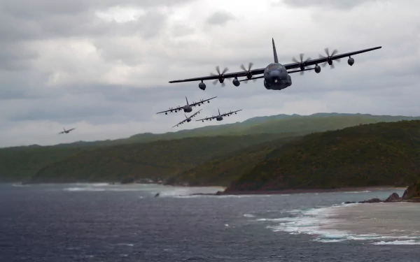 Lockheed MC-130 transport warplanes in formation flying low over a rugged coastline under cloudy skies — 4K Ultra HD military PC desktop wallpaper/background