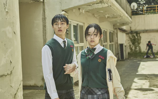 Characters from the TV show All of Us Are Dead stand tense in a school courtyard, featured in a 4K Ultra HD PC desktop wallpaper background.