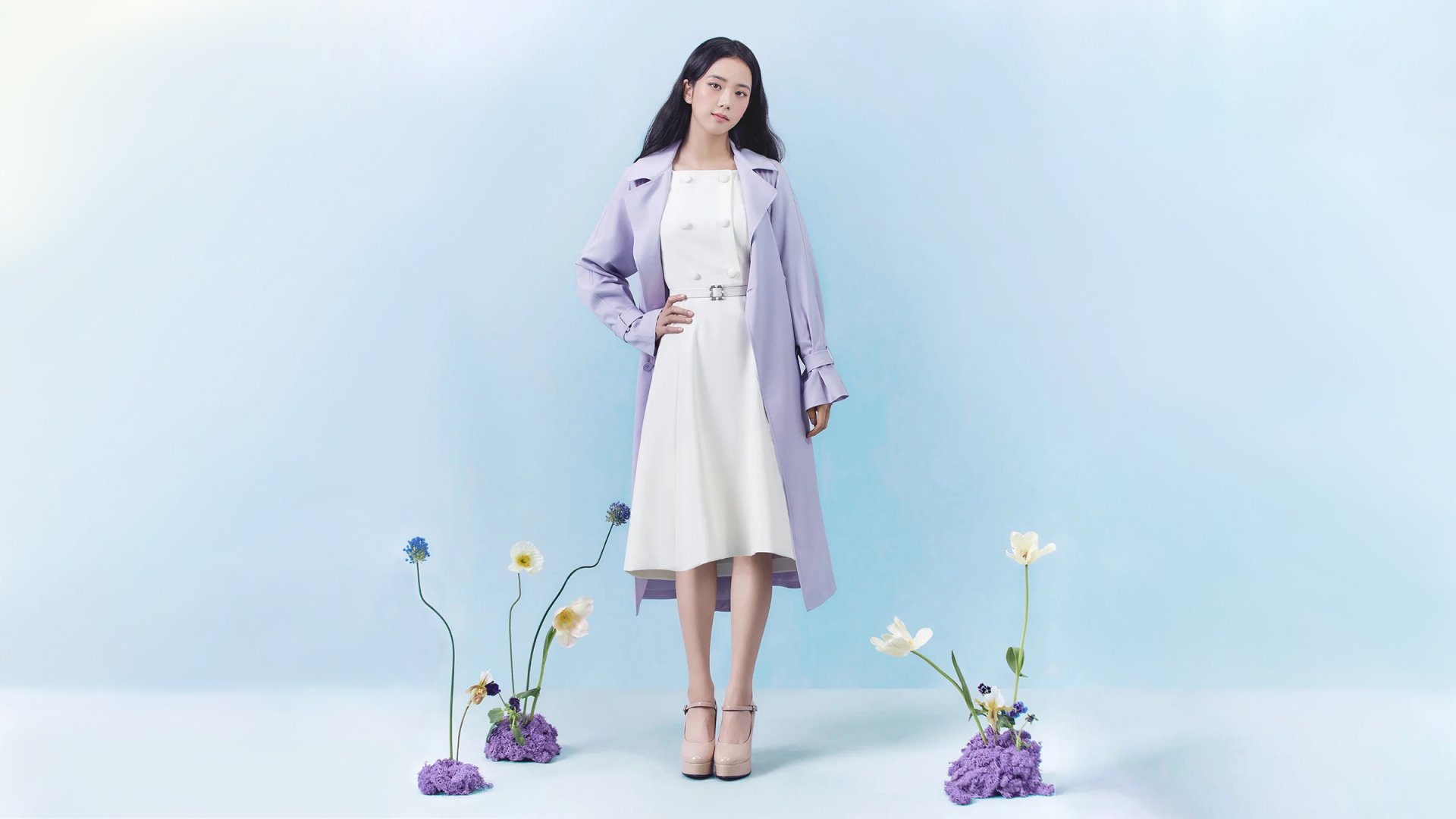 HD PC desktop wallpaper featuring Jisoo from BlackPink in a white dress and light purple coat, standing against a soft blue background with delicate flowers.