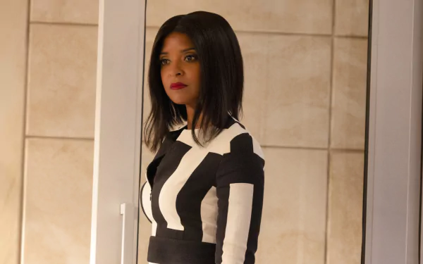 HD PC desktop wallpaper from She-Hulk: Attorney at Law showing a woman in a black-and-white dress standing in a modern office doorway with a serious expression.