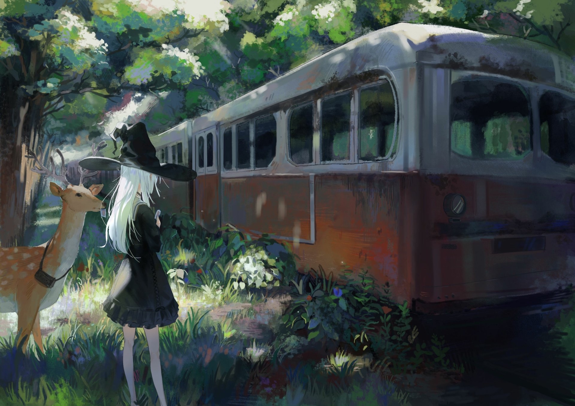 Anime-style HD desktop wallpaper featuring a witch in a black dress and hat standing beside a deer near an abandoned train in a sunlit forest.