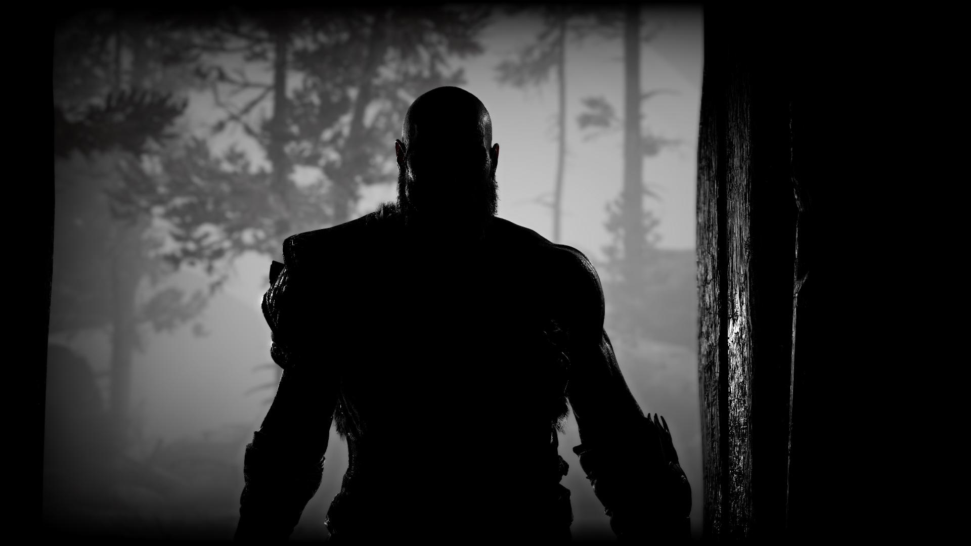 Silhouetted figure from God of War (2018) stands in shadowed forest, captured in 4K Ultra HD for PC desktop wallpaper and background.