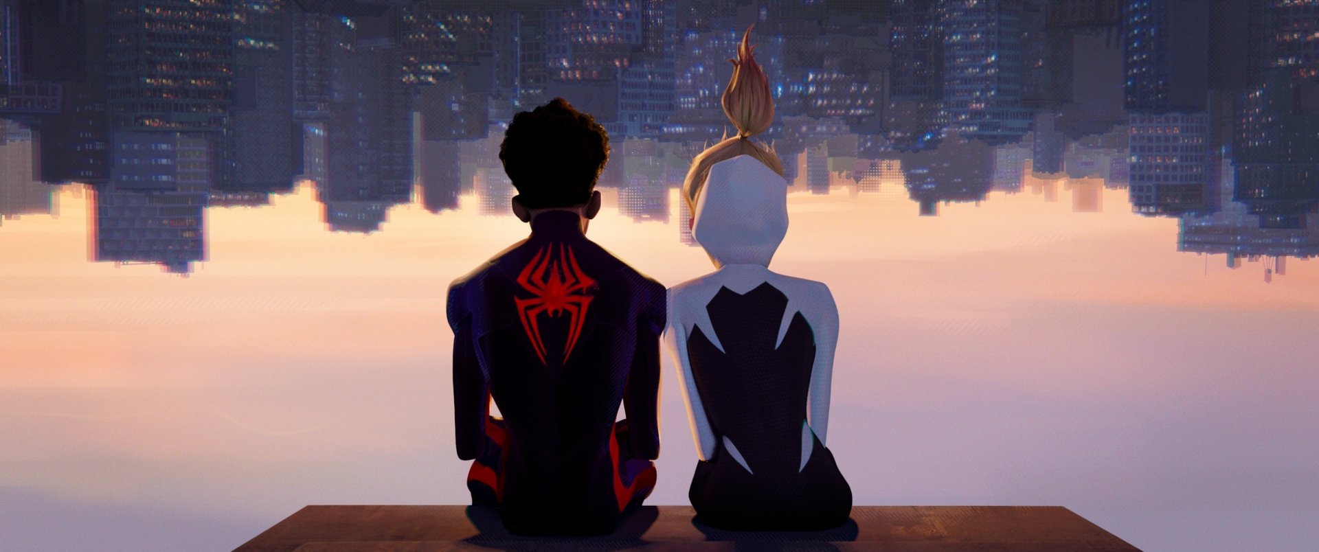 HD PC desktop wallpaper featuring silhouetted Spider-Man characters from the movie Spider-Man: Across the Spider-Verse sitting side by side against a city skyline at dusk.